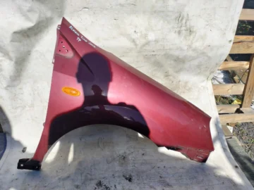 NISSAN ALMERA TINO BŁOTNIK PRAWY BORDOWY