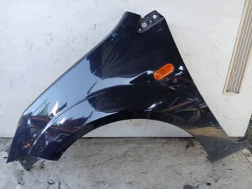 FORD FIESTA MK6 VI BŁOTNIK LEWY 84