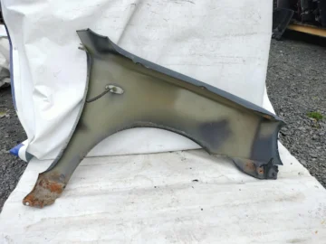 NISSAN MICRA K11 BŁOTNIK LEWY Z11 - zdjęcie 2