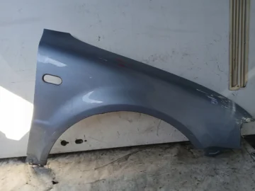 VW PASSAT B5 BŁOTNIK PRAWY LL5Y